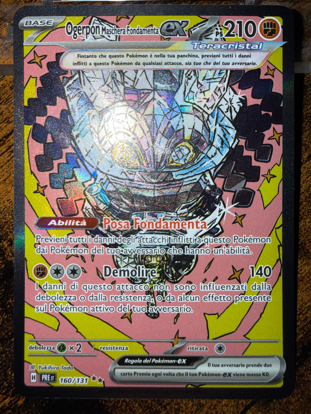 Ogerpon Maschera Fondamenta ex (PRE 160)
Evoluzioni Prismatiche - Cornerstone Mask Ogerpon ex - Singles NM